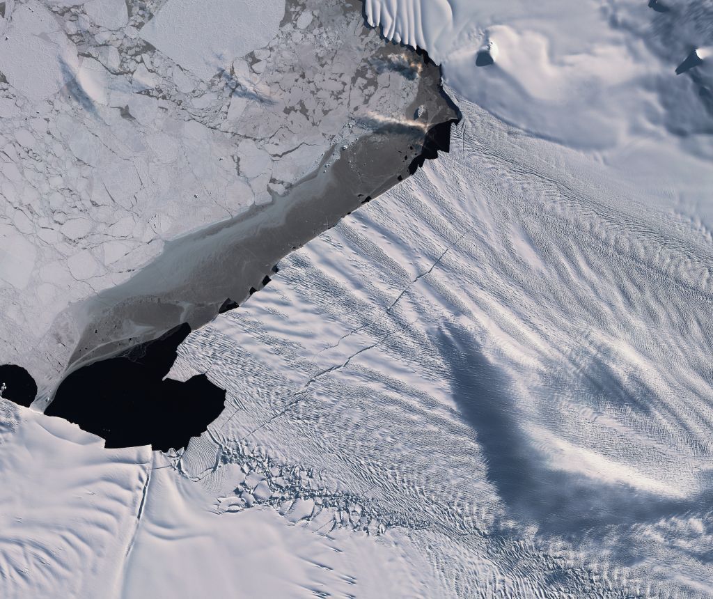 A photo from Europe&#039;s Copernicus Sentinel-2 satellite shows two gargantuan cracks forming along the edge of Antarctica&#039;s Pine Island Glacier, one of the fastest-shrinking glaciers on the continent. 