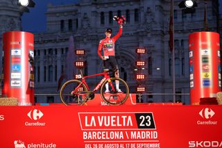 2023 Vuelta a España winner Sepp Kuss celebrates on the final podium