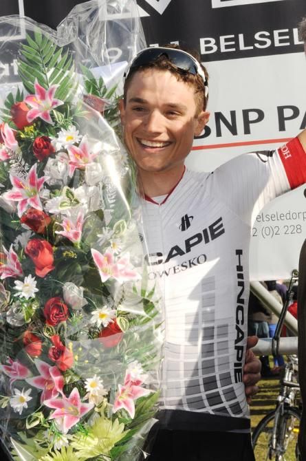 Robin Carpenter (Hincapie Sportswear Development Team) on the podium after winning the Puivelde Kermis in Belgium in mid-May