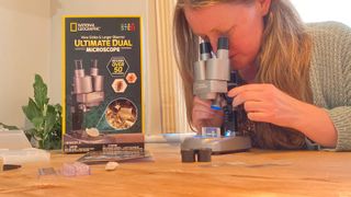 National Geographic Ultimate Dual Stereo Microscope being used by the author