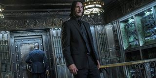 John Wick: Chapter 3 John standing in The Continental's armory