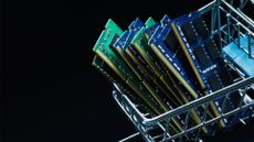 Eight RAM modules piled up against each other in a shopping cart.