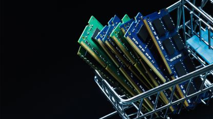 Eight RAM modules piled up against each other in a shopping cart.