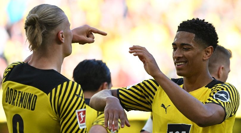 Erling Haaland and Jude Bellingham celebrate a goal for Borussia Dortmund against Wolfsburg in 2022.