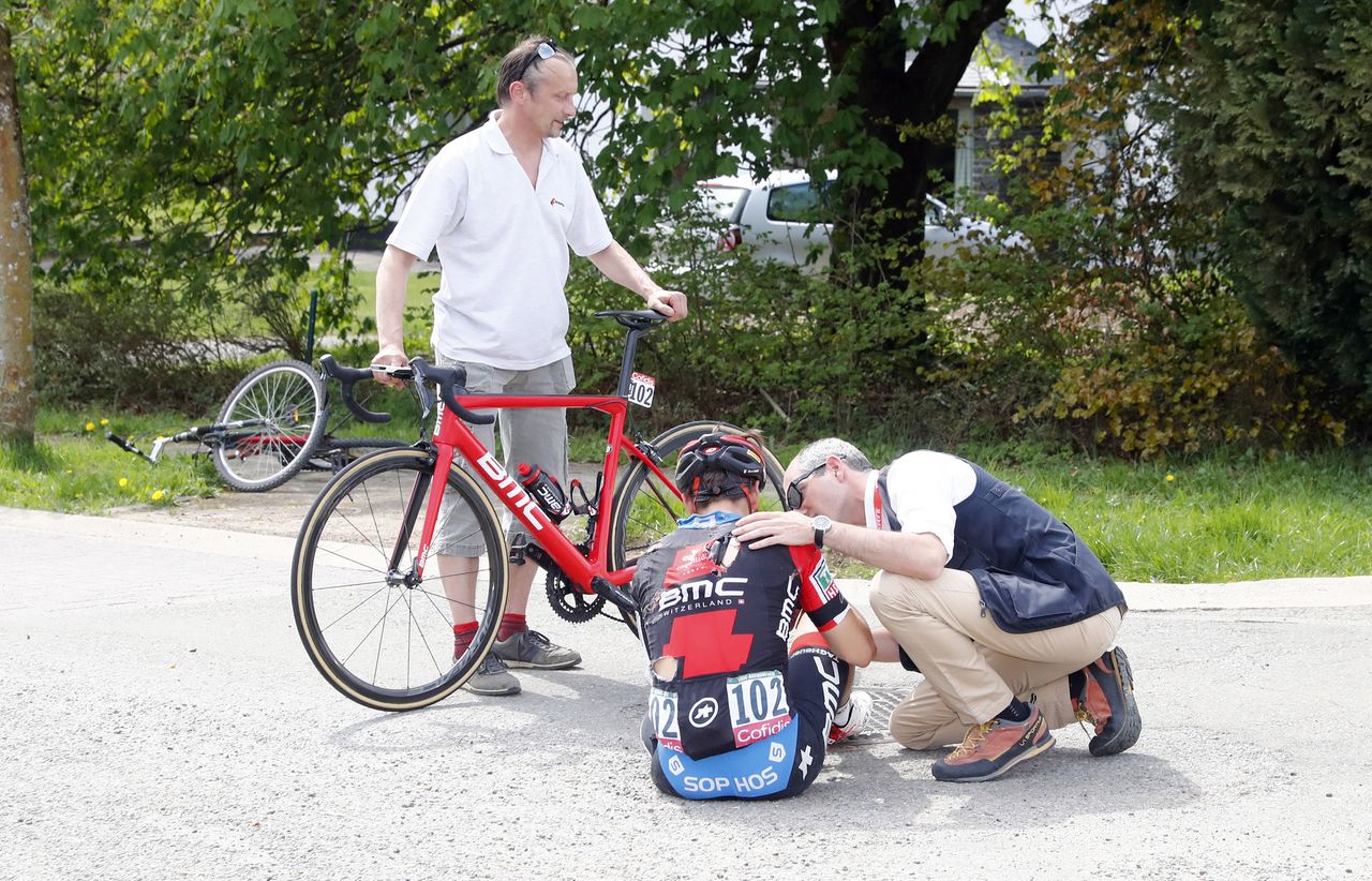 Alberto Bettiol is assisted by the race doctor