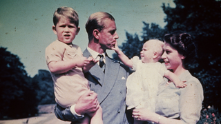 Princess Elizabeth with her husband Prince Philip, Duke of Edinburgh, and their children Prince Charles and Princess Anne, August 1951