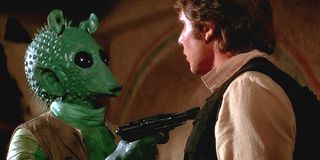 Greedo holding a gun to Han Solo in A New Hope