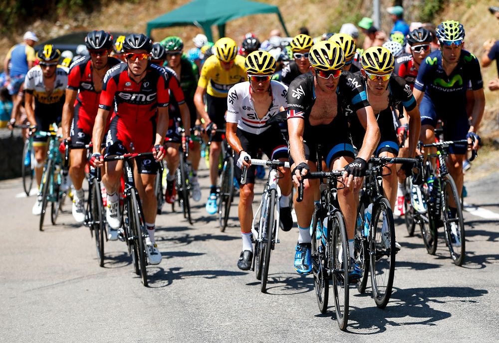 Team Sky and BMC ride in the peloton during stage 11.