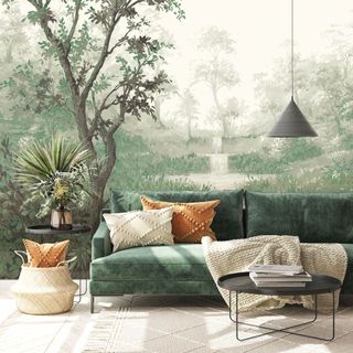 living area with green sofa and wallpaper wall