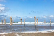 End of summer at the Arenal beach in Javea, Alicante, Comunidad Valenciana, Spain 12017, signifying the end of the summer and Carlo Ratti's Objectify series for wallpaper*