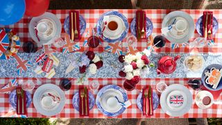 Jubilee party table with jubilee decorations and tableware