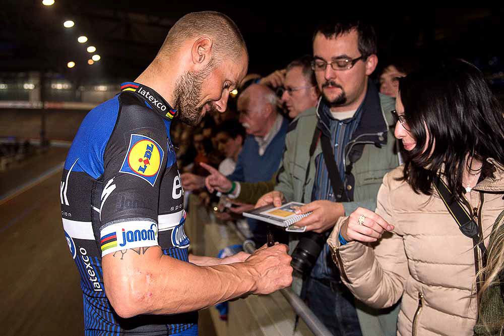 Tom Boonen signs an autograph at the Etixx-QuickStep team presentation.