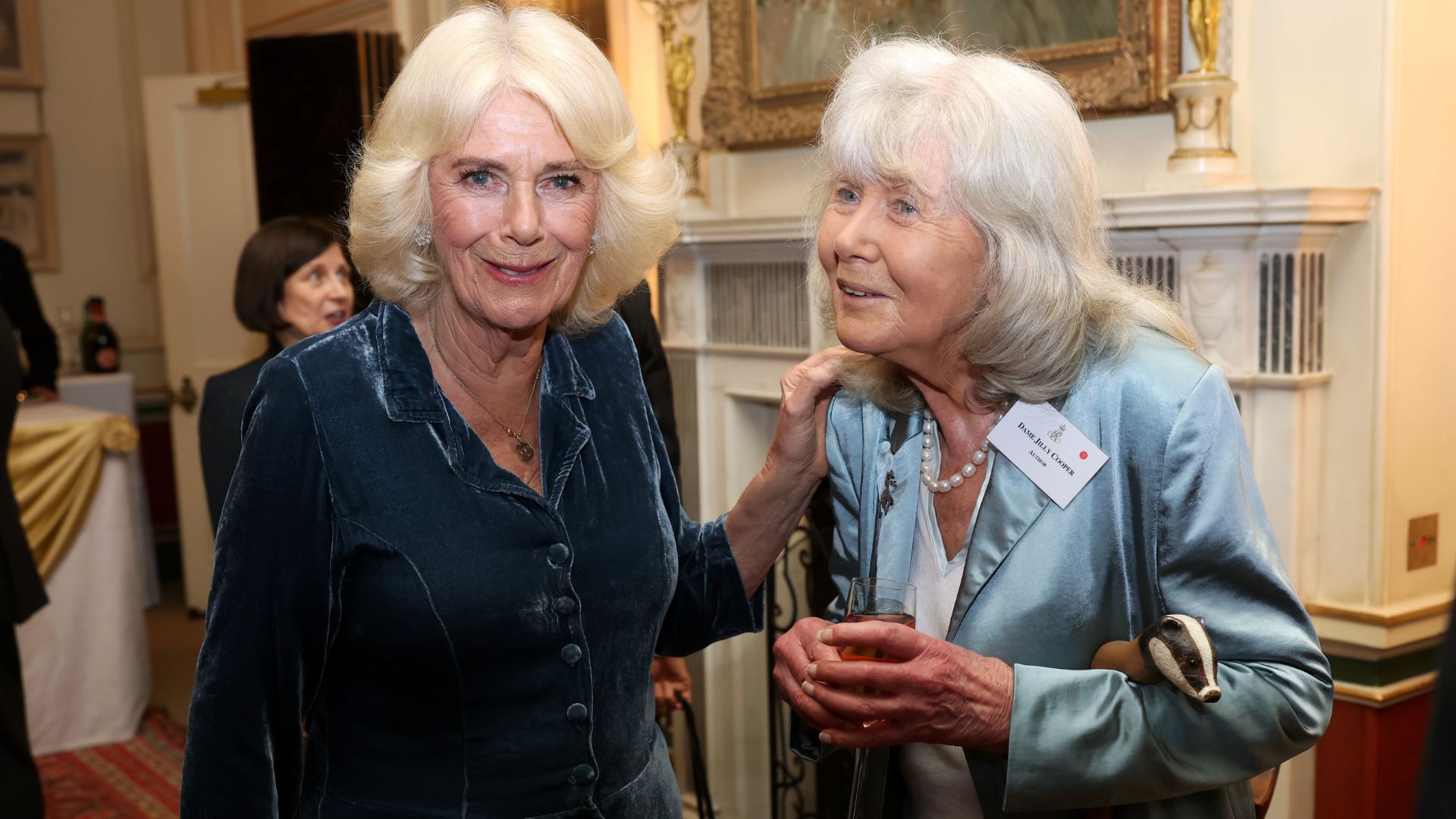 Queen Camilla and Jilly Cooper pose during a reception to mark the launch of the Queen's reading room medal at Clarence House on March 25, 2025