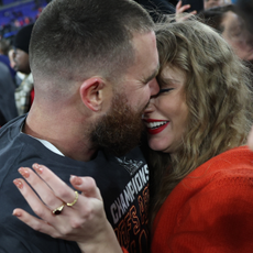 Travis Kelce #87 of the Kansas City Chiefs embraces Taylor Swift after a 17-10 victory against the Baltimore Ravens in the AFC Championship Game