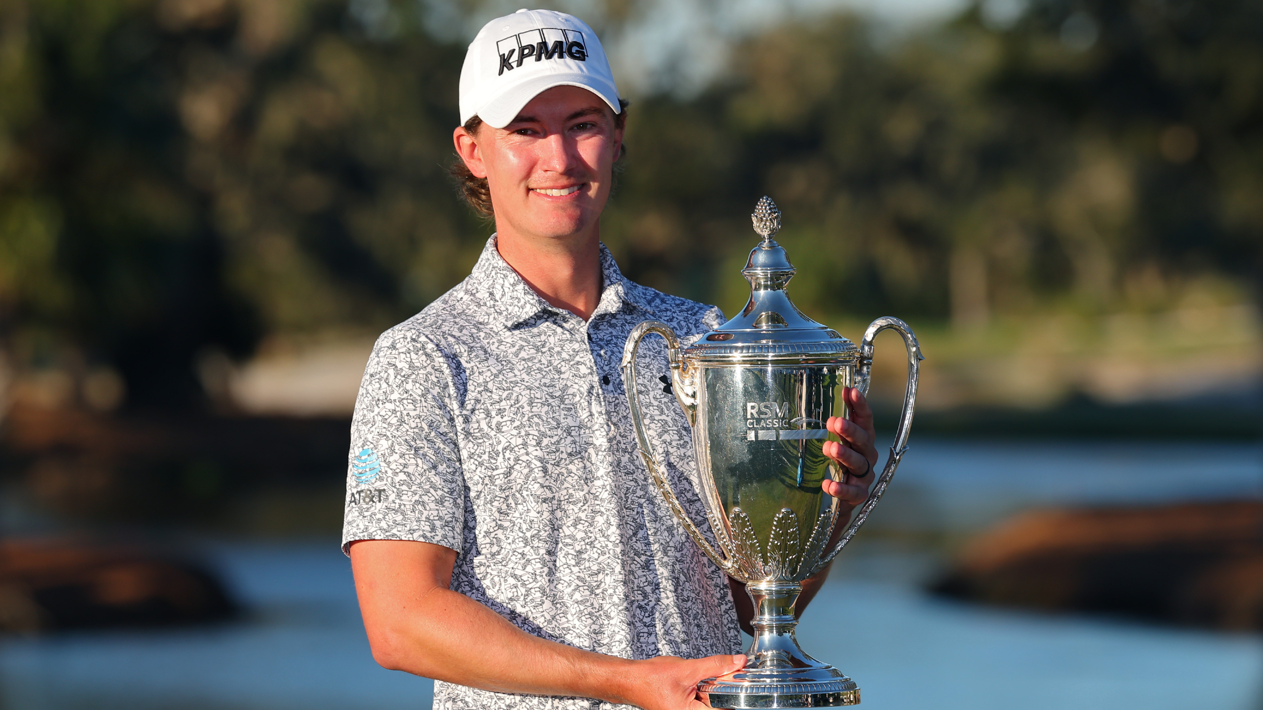 Maverick McNealy with the RSM Classic trophy