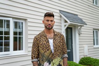 Jake Quickenden outside his Essex home in Celebrity Help! My House Is Haunted