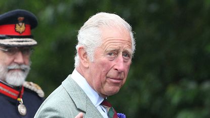 Britain's Prince Charles, Prince of Wales gestures during a visit to the DS McGregor and Partners Veterinary Surgery in Thurso, Caithness on July 29, 2021, as part of a two-day visit to Scotland. (Photo by Paul Campbell / POOL / AFP) (Photo by PAUL CAMPBELL/POOL/AFP via Getty Images)