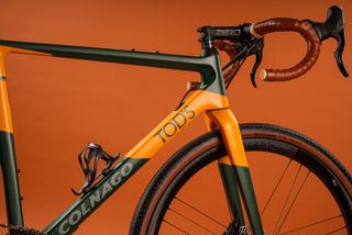 Colnago x Tod's T bike front end on an orange background
