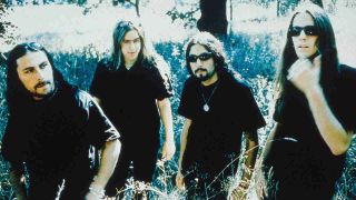 Opeth posing for a photograph in 2001