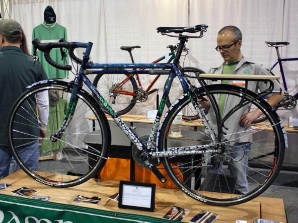 This Shamrock Cycles 'Belle Fast' was painted by Kate Oberreich and depicts "her interpretation of a road ride along a stream on a southern Indiana night."