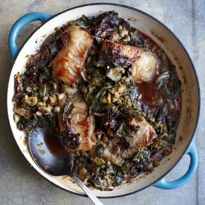 Pork Belly with greens, olives and capers photo
