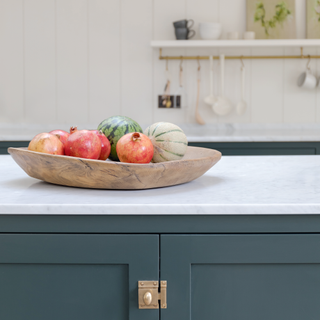 Blue country-style kitchen with island and butcher's table