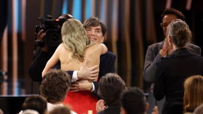 Emily Blunt hugs Cillian Murphy at the 2024 SAG Awards