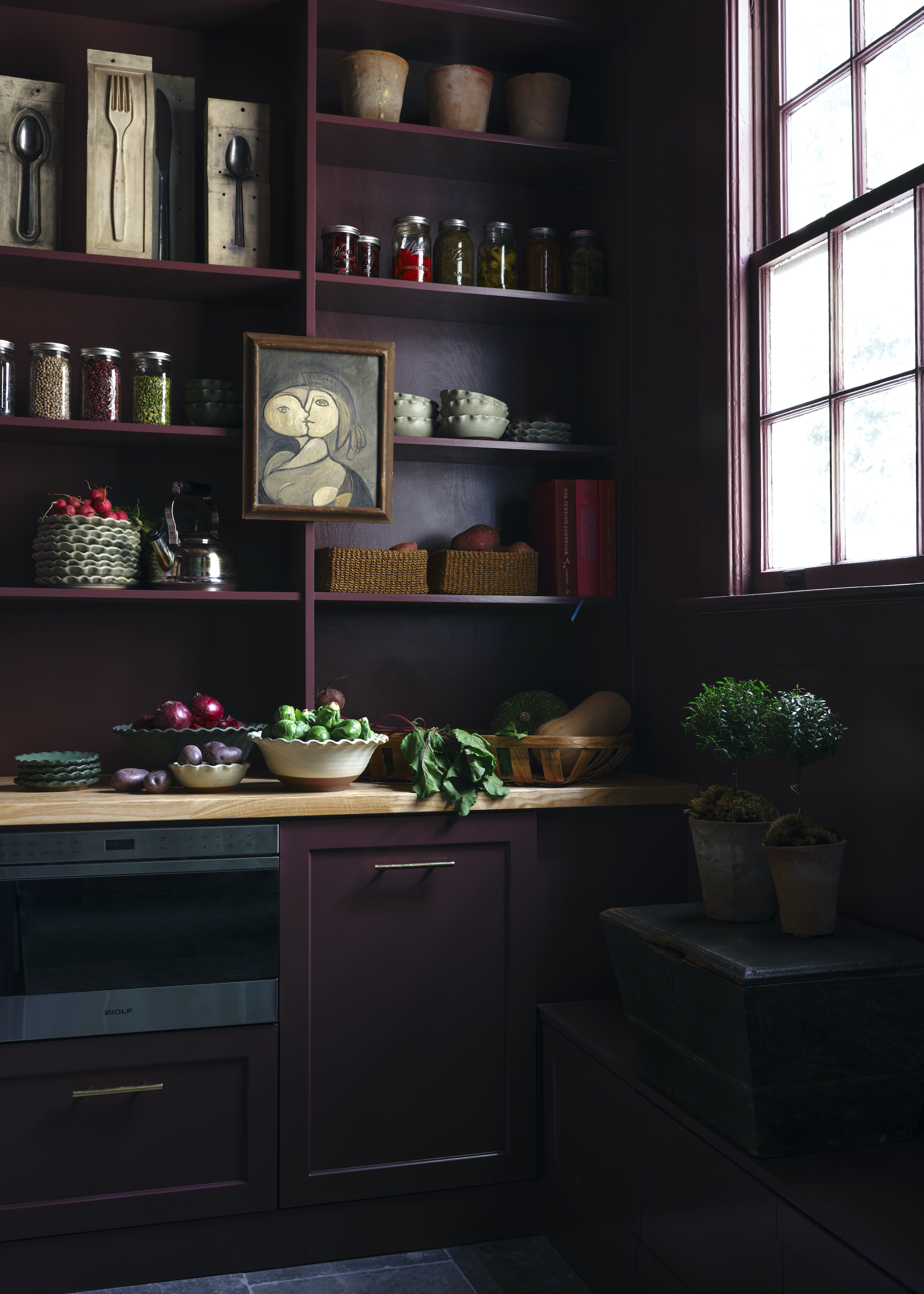 dark aubergine pantry with oak worktops