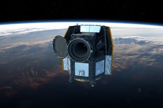 a small cube-shaped spacecraft in orbit around Earth