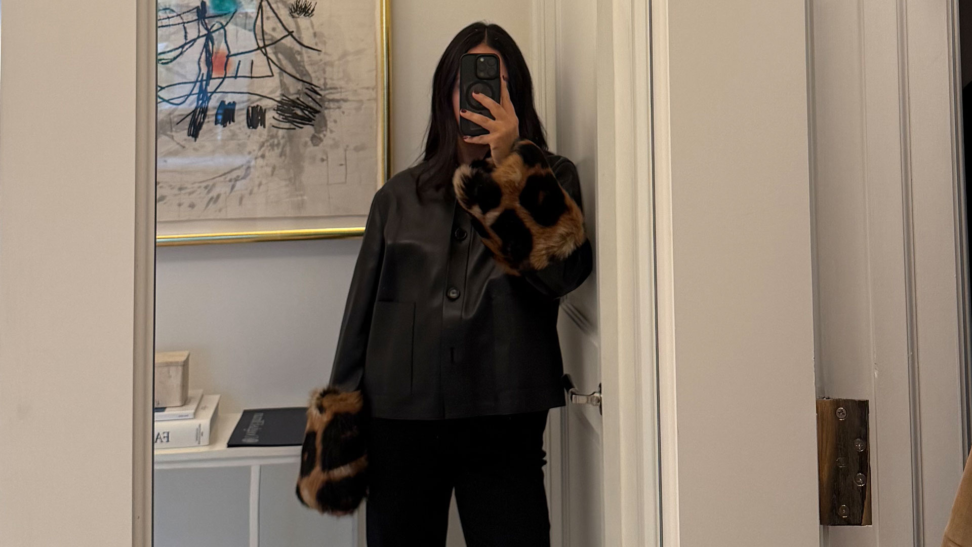 @nicoleakhtarzad loewe leather jacket with leopard cuffs
