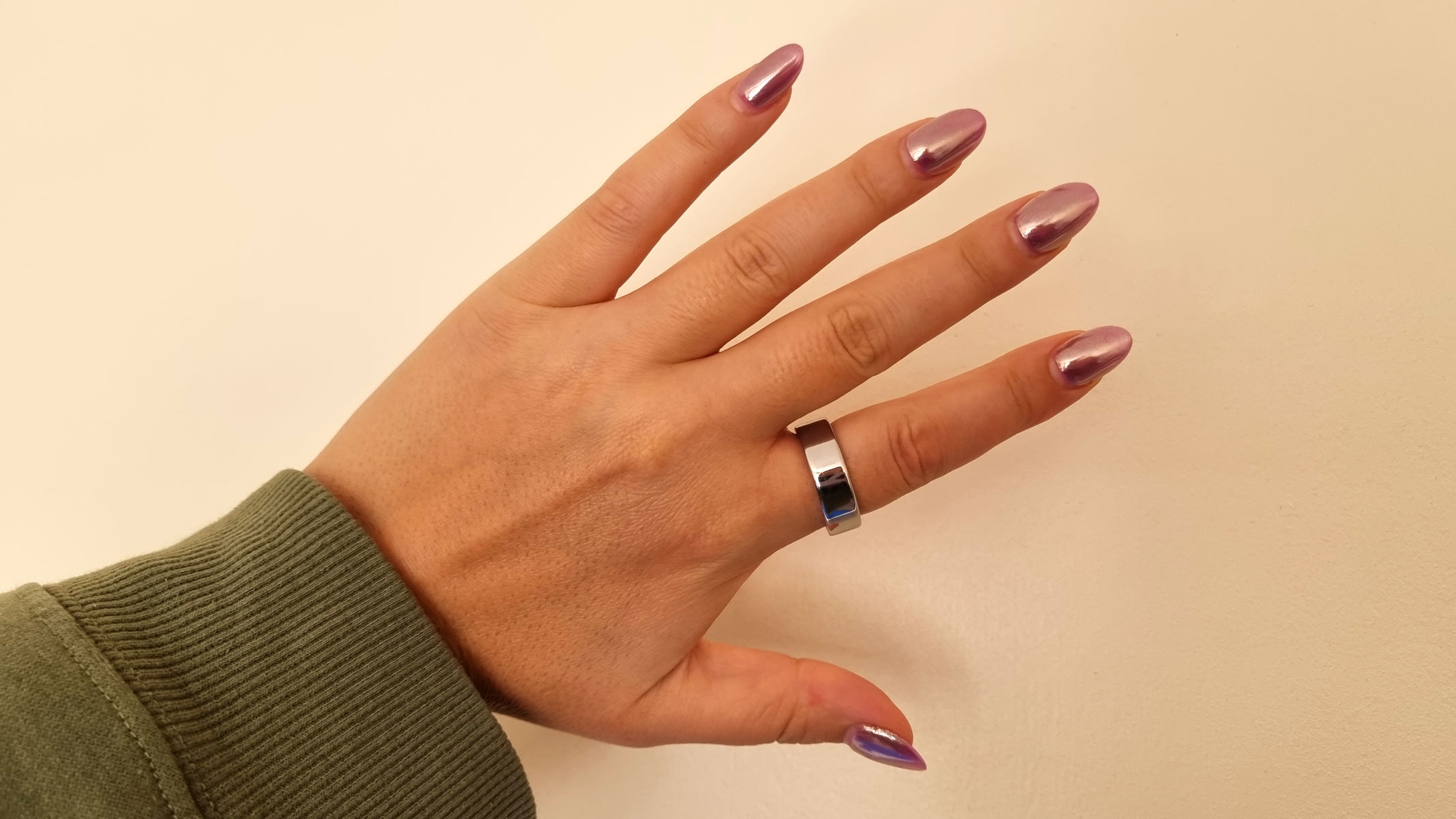 A close-up image of our reviewer's hand wearing the Oura Ring Gen 4