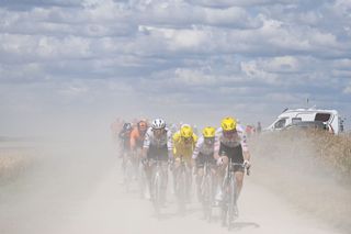 TROYES FRANCE JULY 07 LR Christophe Laporte of France Tadej Pogacar of Slovenia Yellow Leader Jersey Adam Yates of The United Kingdom and Tim Wellens of Belgium and UAE Team Emirates compete passing through a dusty gravel strokes sector during the 111th Tour de France 2024 Stage 9 a 199km stage from Troyes to Troyes UCIWT on July 07 2024 in Troyes France Photo by Bernard Papon PoolGetty Images