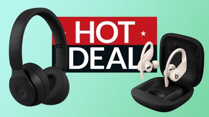 Beats Solo 3 and Powerbeats Pro on turquoise background with sign saying Hot Deal