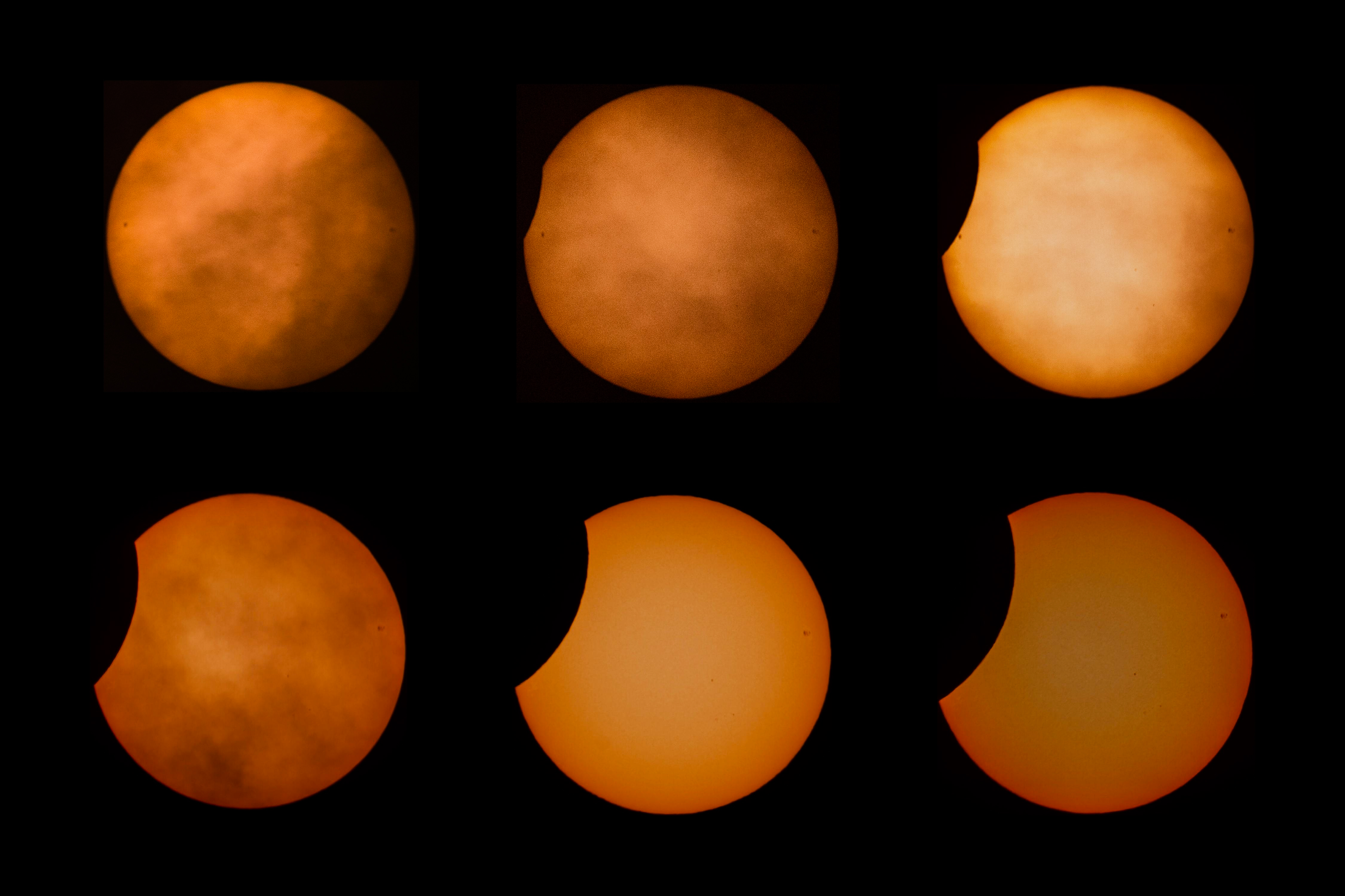 Ein zusammengesetztes Bild aus mehreren Ansichten einer partiellen Sonnenfinsternis, die am 25. Oktober 2022 von Italien aus gesehen wurde