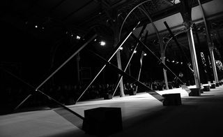 Giant metallic beams that lined the runway in the air