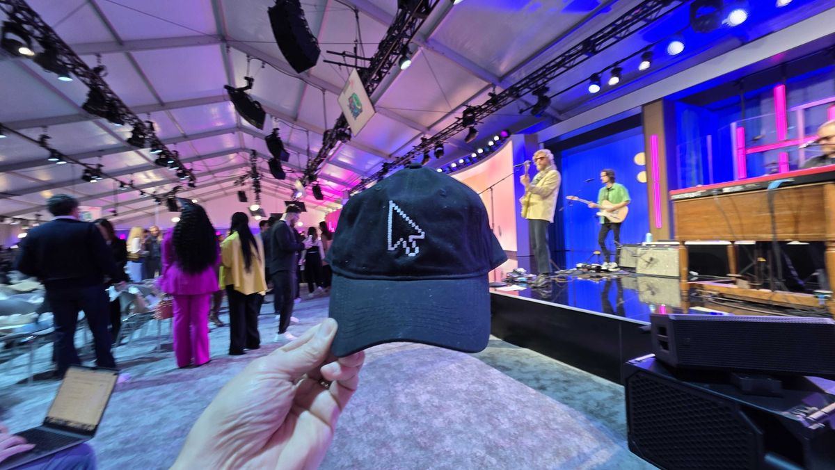 Swag celebrating Microsoft milestones and a presentation at the Microsoft 50th anniversary event
