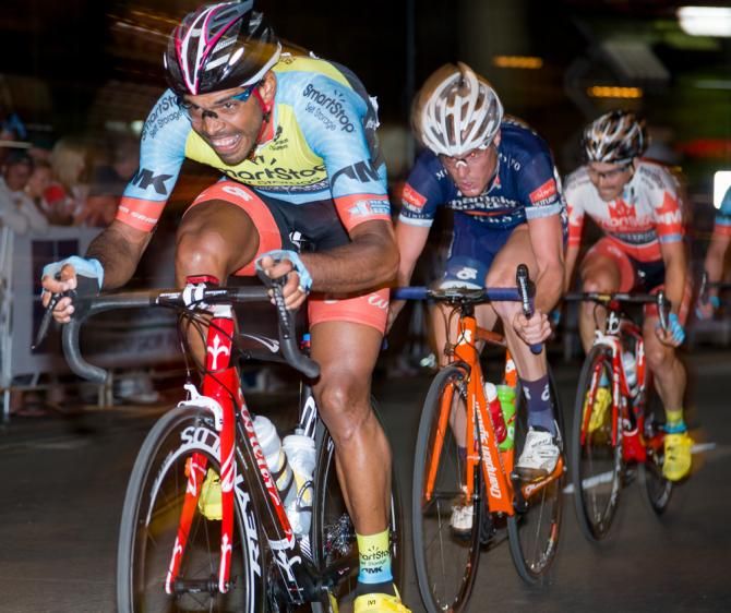 Frank Travieso (SmartStop-Mountain Khakis) keep the break in check.