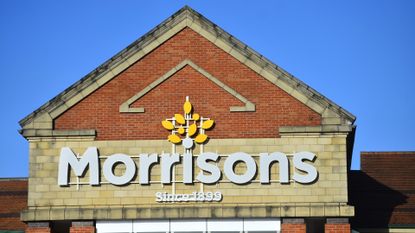 A logo of Supermarket company, Morrisons is seen outside one of its stores on November 13, 2020 in Newcastle-Under-Lyme, Staffordshire
