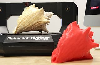 The original conch shell (left) and a 3D printed copy. 3D prints can be painted to add detail.