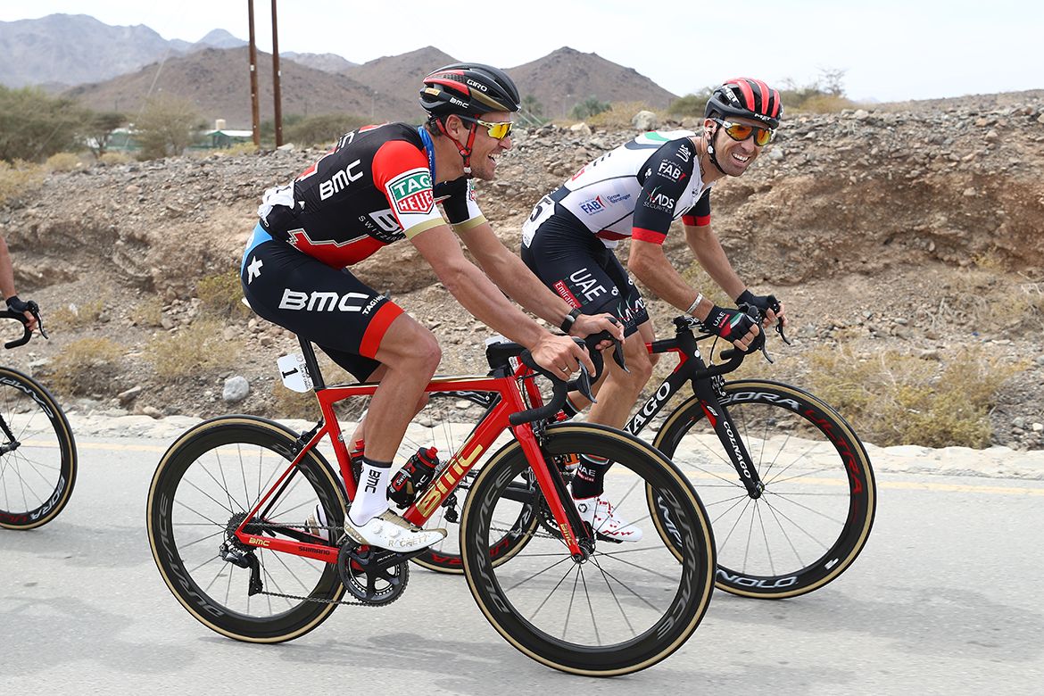 Greg Van Avermaet shares a joke with Marco Marcato.