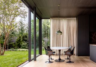 minimalst sag harbour house with large glazed windows and clean aesthetic inside and out