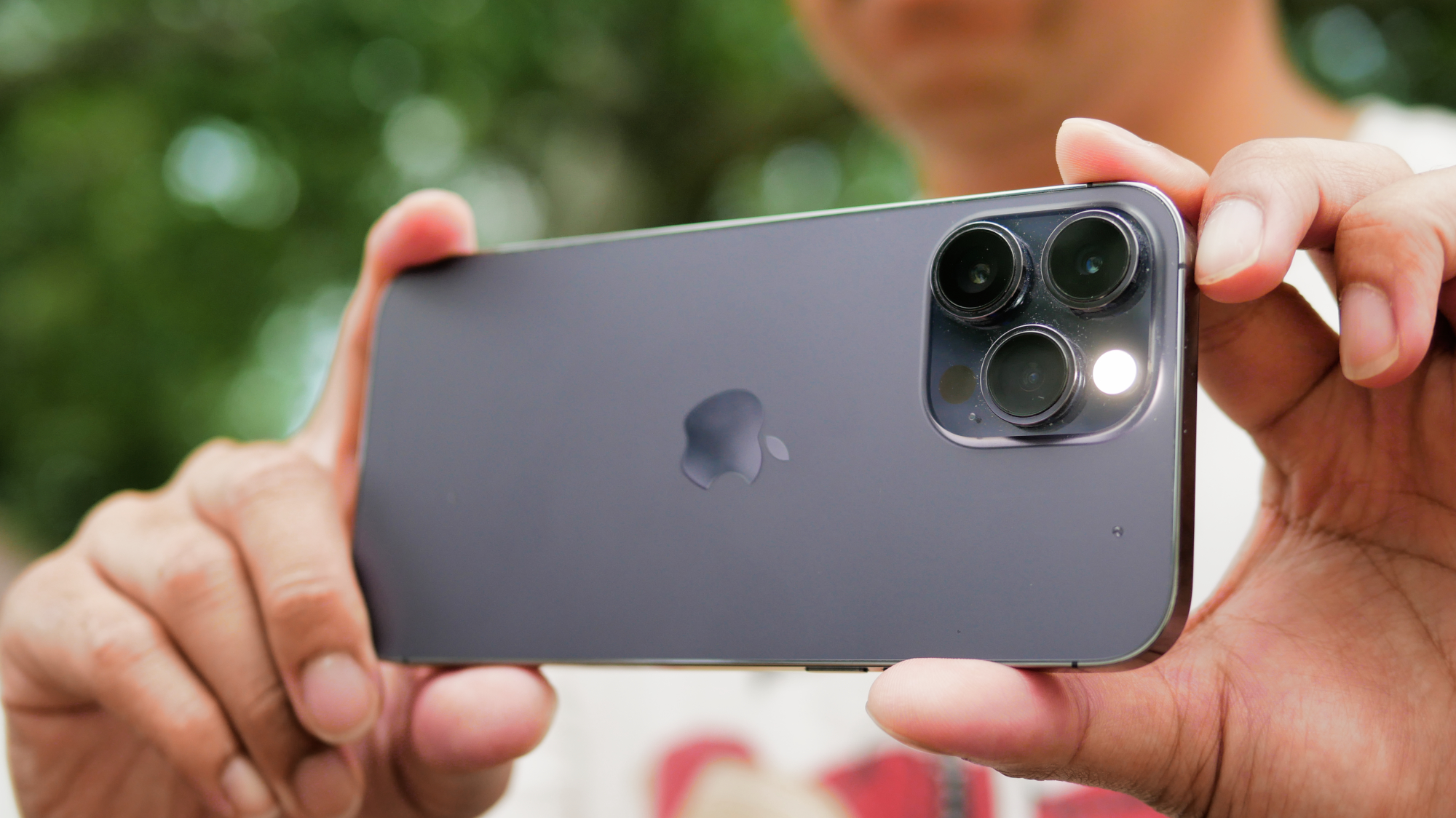 Closeup of Apple iPhone 14 Pro Max cameras.