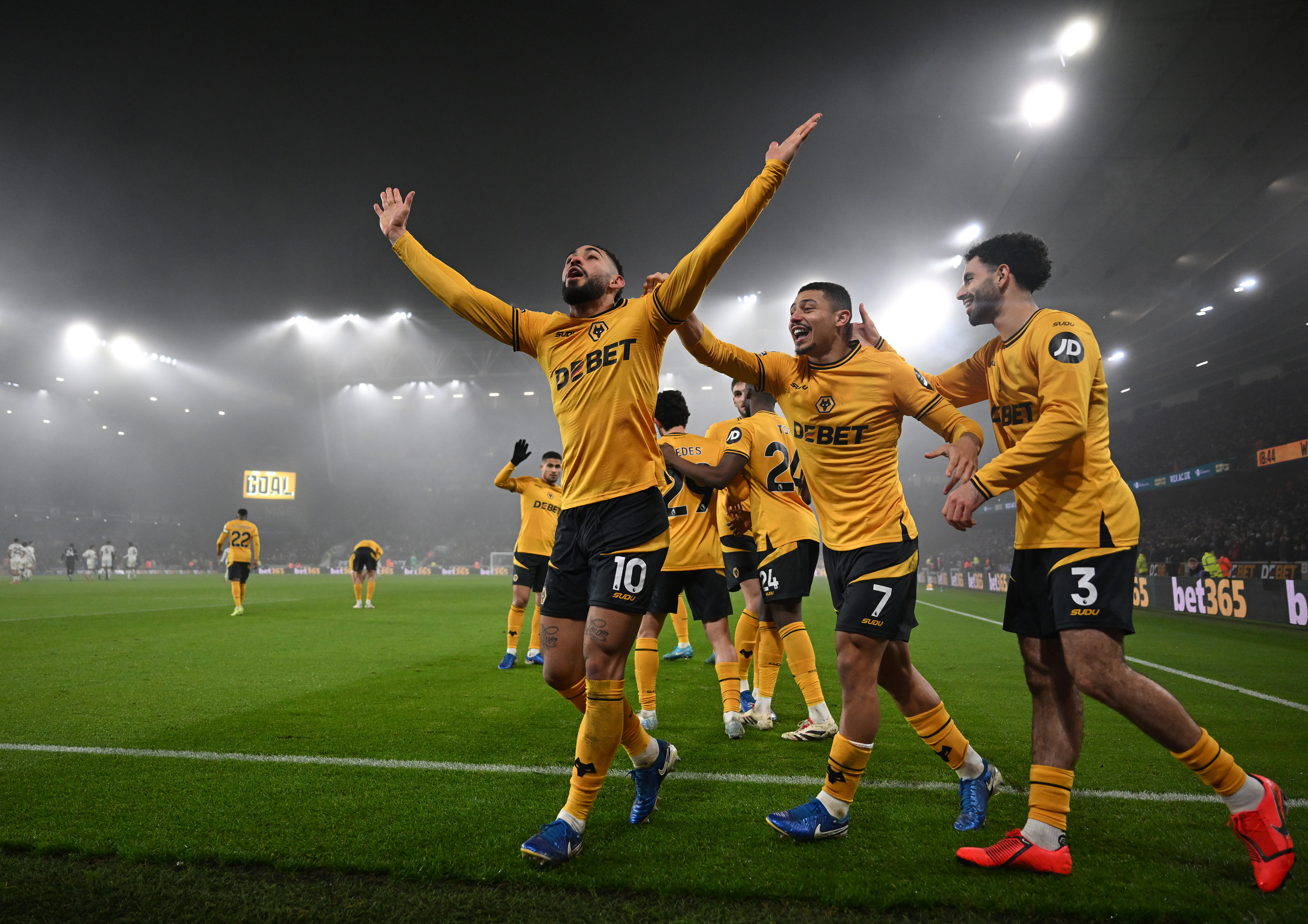 Matheus Cunha celebrates with his team-mates after scoring for Wolves against Mancheter United in the Premier League at Molineux in December 2024.