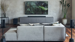 Sony HT-A7000 Soundbar in a living room under a wall-mounted TV