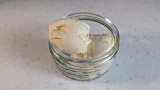 Vanilla ice cream in a glass ramekin