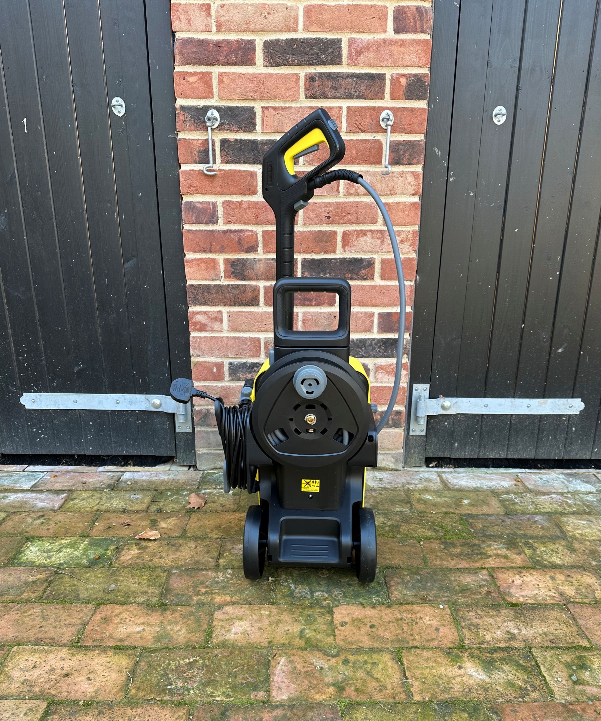 A yellow Karcher K5 comfort premium pressure washer after unboxing and assembling