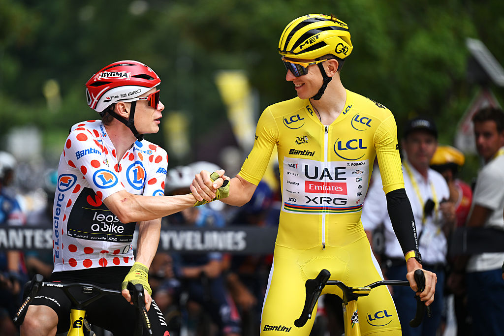 MANTES-LA-VILLE, FRANCE - JULY 27: (L-R) Jonas Vingegaard of Denmark and Team Visma | Lease a Bike - Polka dot Mountain Jersey and Tadej Pogacar of Slovenia and UAE Team Emirates - XRG - Yellow leader jersey prior to the 112th Tour de France 2025, Stage 21 a 132.3km stage from Mantes-la-Ville to Paris - Champs-Elysees / #UCIWT / on July 27, 2025 in Mantes-la-Ville, France.