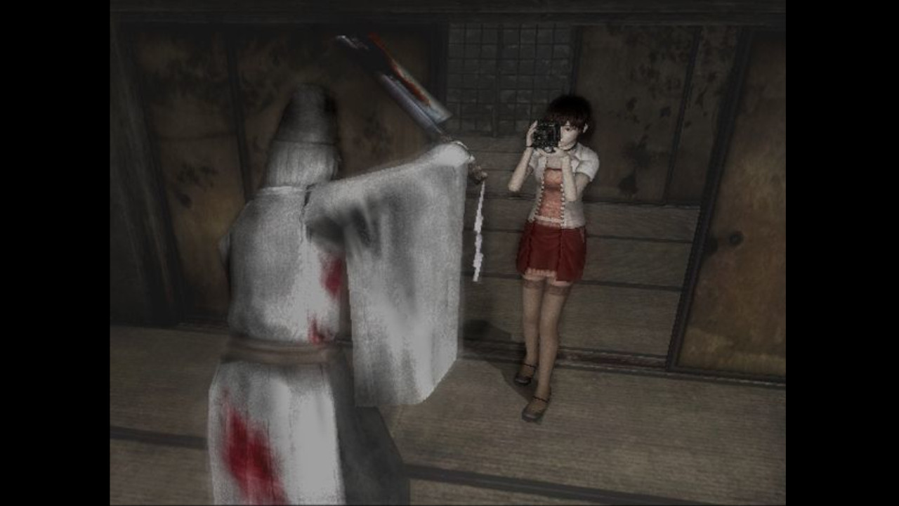 A ghost attacks with a kitchen knife in Fatal Frame 3 (AKA Project Zero 3)