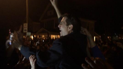Dayton won another big March Madness upset, so naturally the school's president went crowdsurfing