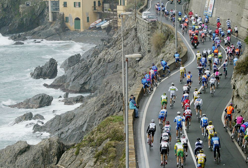 The peloton rides next to the sea in Varazze during the 95th edition of Milan-San Remo